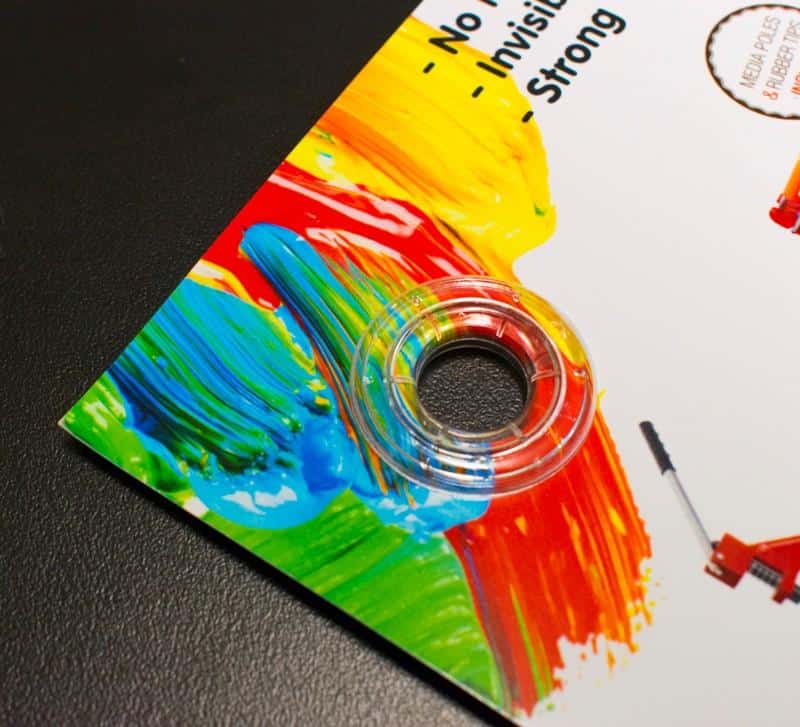 Clear-plastic-eyelet-applied-to-colour