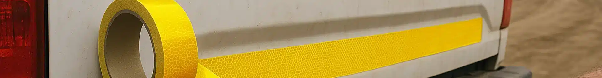 Yellow and black safety adhesive tapes for floor marking and hazards