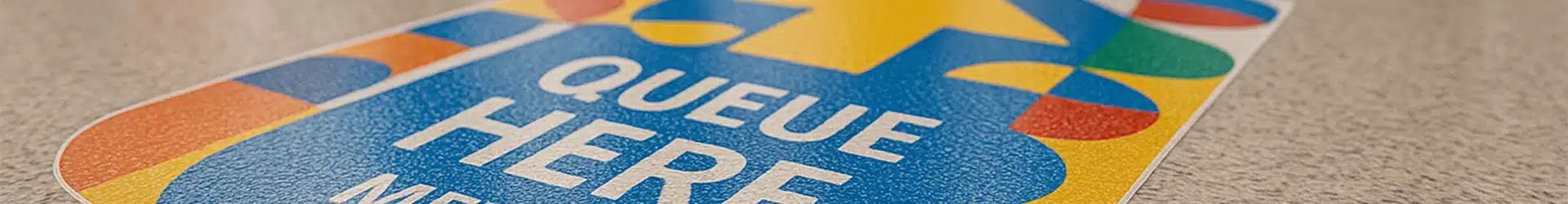 floor graphic laminate over printed vinyl in a retail store aisle.